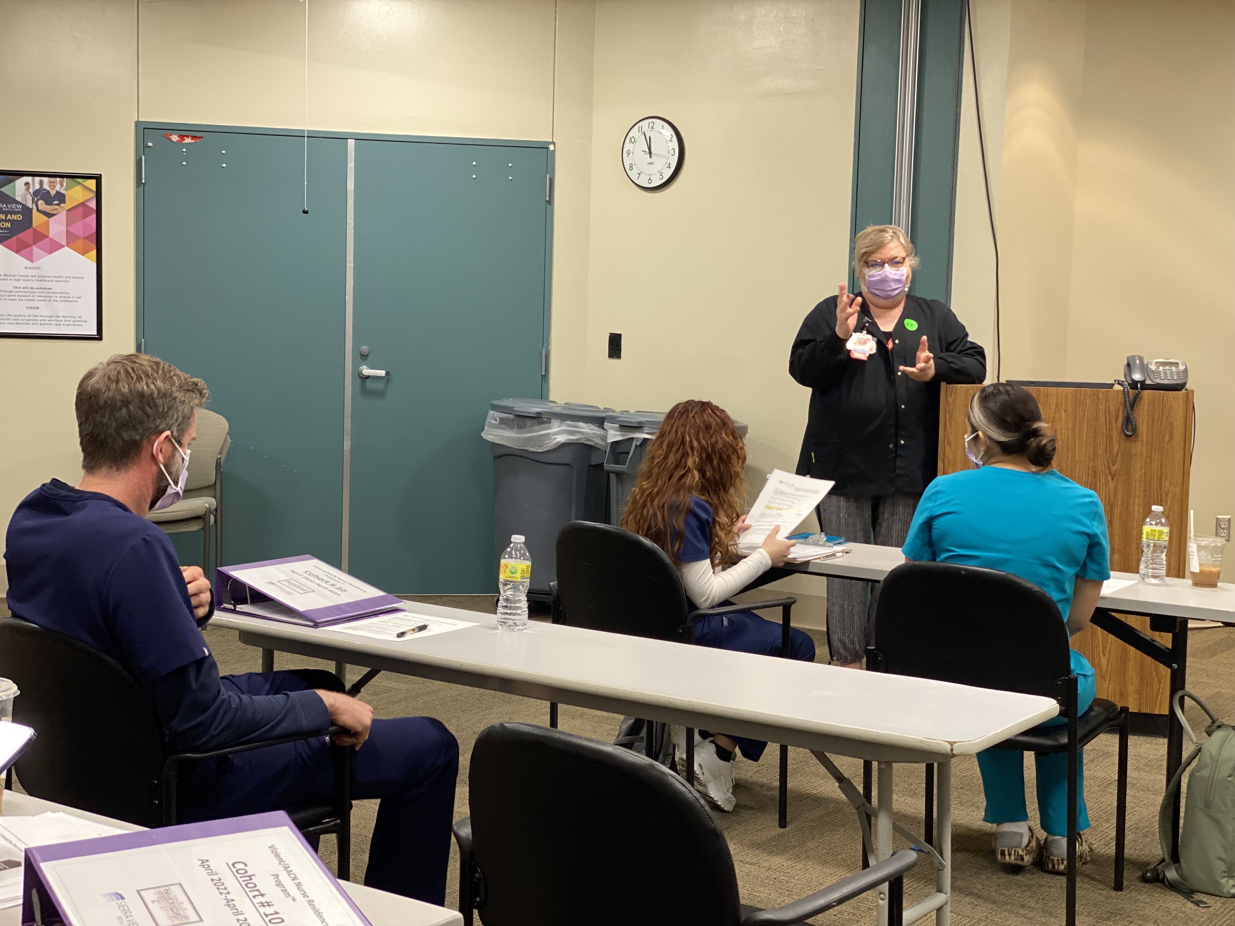 Photo of Clinical Educator Christine Williams MSN, RN, CCRN, PHN and cohort 10 nurse residency team members.