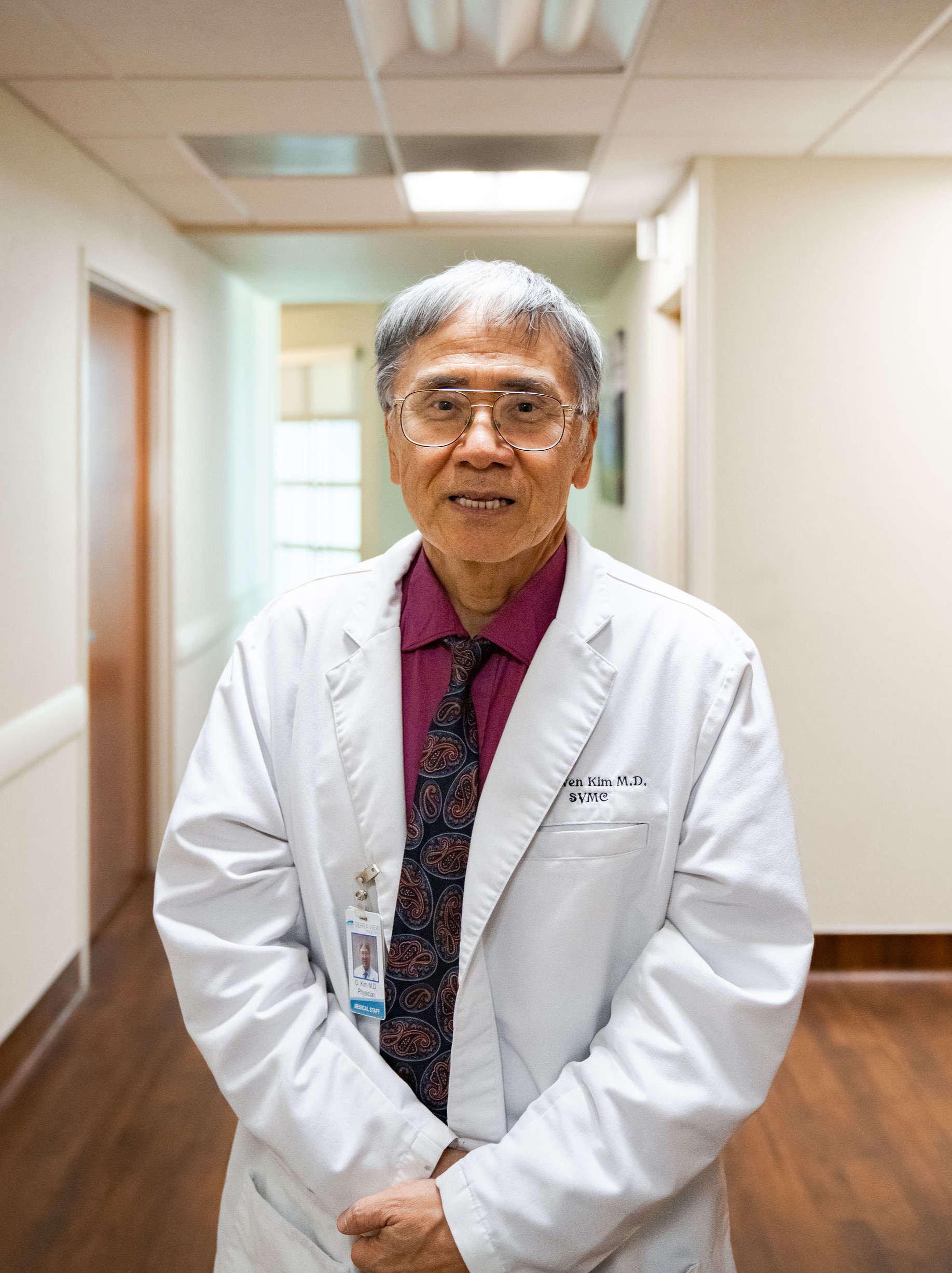 dr. owen kim in lab coat